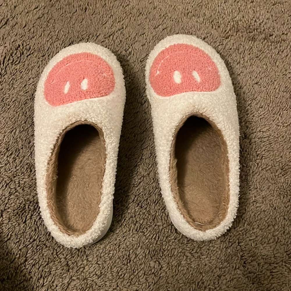 Pink and white smiley slippers